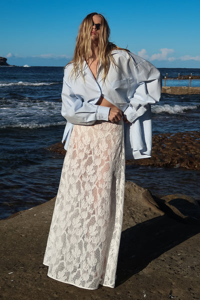 Zoe wearing LUCINE WHITE LACE MAXI SKIRT