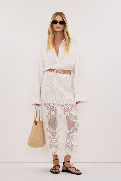 Zoe wearing REINA IVORY LACE MIDI SKIRT
