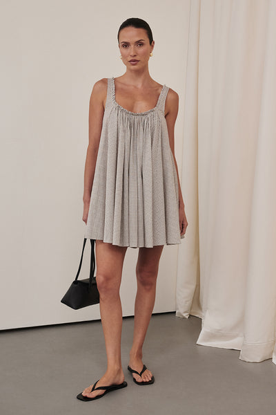 Casey wearing ARABELLA CREAM CHECK MINI DRESS - PRE ORDER
