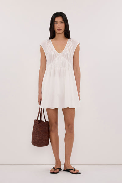 Zoey wearing BILLIE WHITE LINEN BLEND MINI DRESS