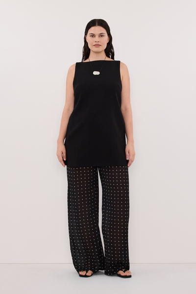 Jasmine wearing ROWIE BLACK SLEEVELESS BOAT NECK TUNIC TOP