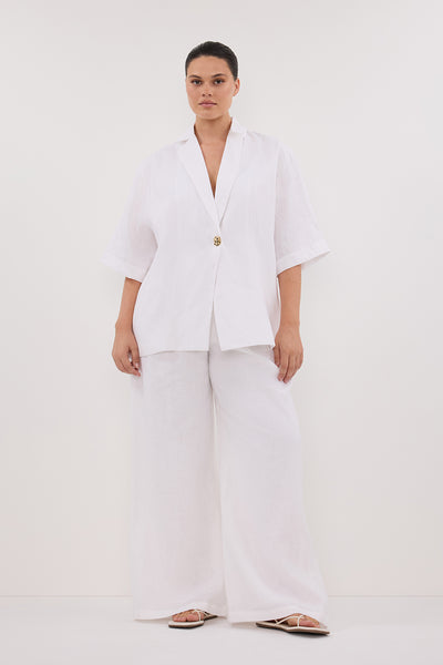 Jasmine wearing NALA WHITE LINEN RESORT SHIRT