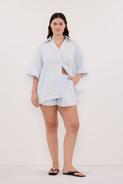 Jasmine wearing HELENA CORNFLOWER OVERSIZED LINEN SHIRT