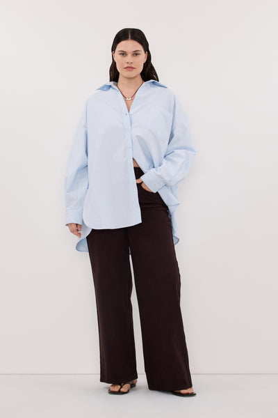 Jasmine wearing RHEA 2.0 ICE BLUE OVERSIZED COTTON SHIRT