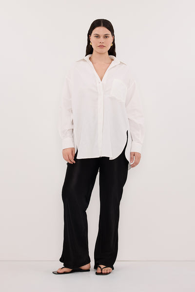 Jasmine wearing RHEA 2.0 WHITE OVERSIZED COTTON SHIRT