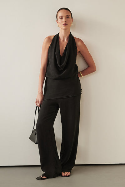 Casey wearing ADDIE BLACK CUPRO DRAWSTRING PANT