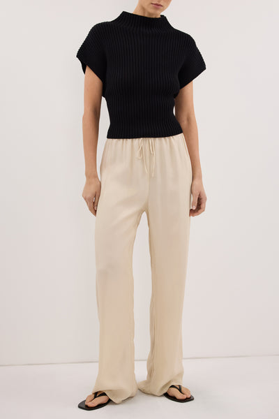 Stas wearing ADDIE STRAW CUPRO DRAWSTRING PANT