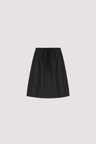 Stas wearing SOMMER BLACK STRAPLESS POPLIN TOP
