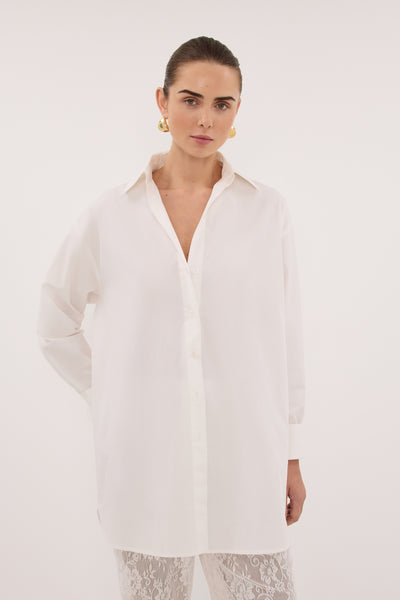 Stas wearing LULU LONGLINE WHITE COTTON SHIRT