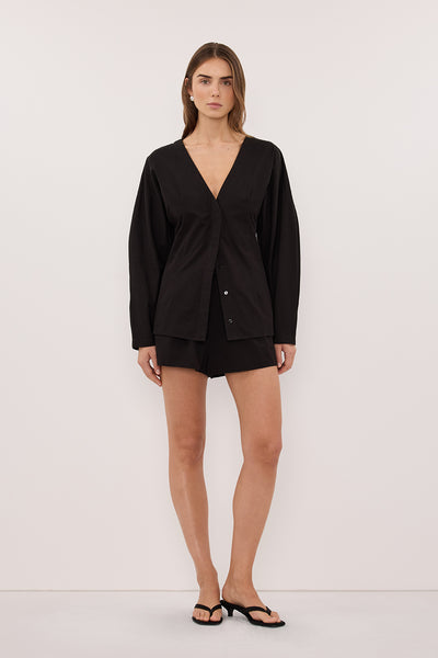 Stas wearing EDENA BLACK COTTON FITTED SHIRT
