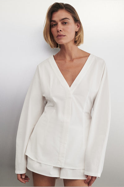 Joanna wearing EDENA WHITE COTTON FITTED SHIRT