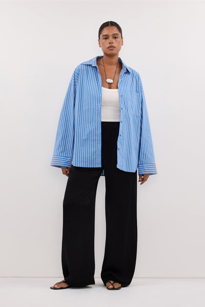 Amanda wearing MISHA AZURE BLUE STRIPE SHIRT