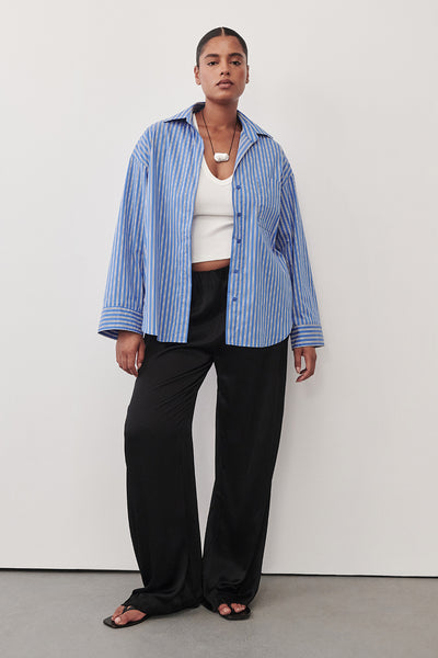 Amanda wearing MISHA AZURE BLUE STRIPE SHIRT
