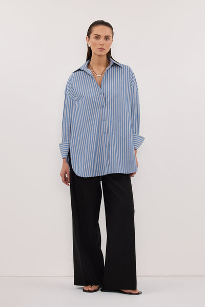 Stas wearing GRACIE LONG SLEEVE BLUE STRIPE SHIRT