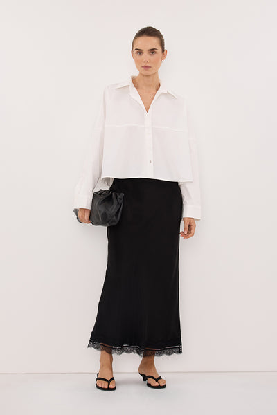 Stas wearing GOLDIE WHITE CROPPED COTTON SHIRT