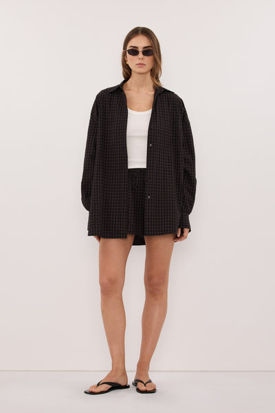 Stas wearing TOVA INK CHECK OVERSIZED COTTON SHIRT