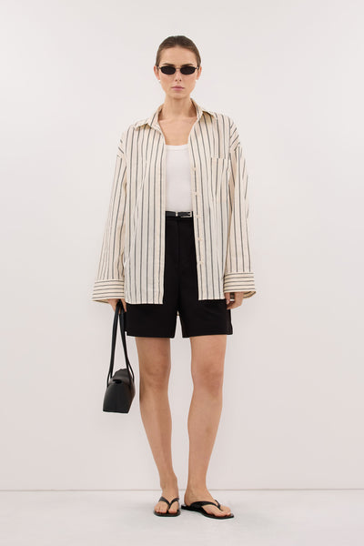 Stas wearing FABLE CREAM SILK BLEND SHIRT