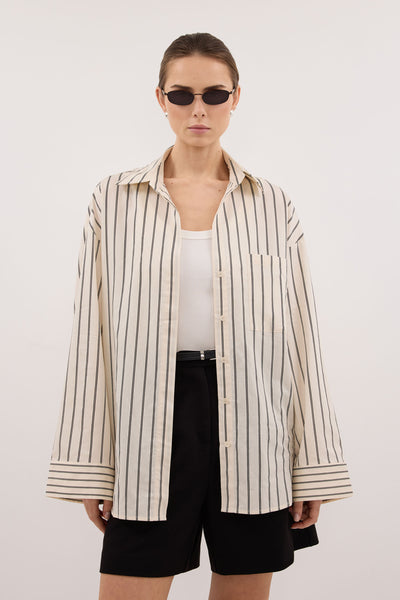 Stas wearing FABLE CREAM SILK BLEND SHIRT