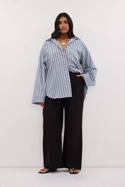 Shanaya wearing FABLE DUSTY BLUE SILK BLEND SHIRT