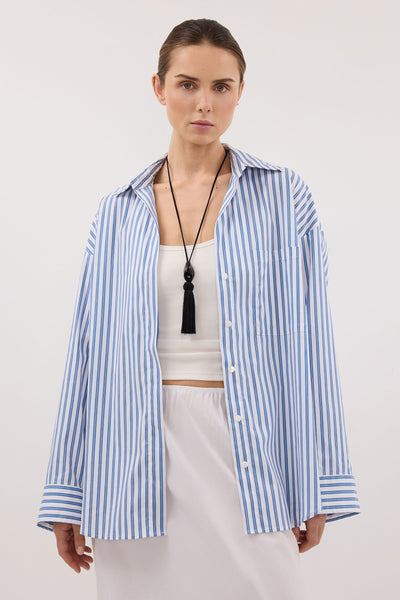 Stas wearing TALISE BLUE STRIPE SHIRT