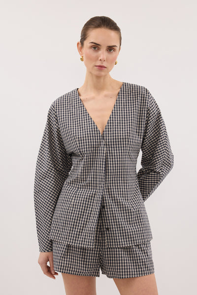Stas wearing MATILDA INK CHECK FITTED SHIRT