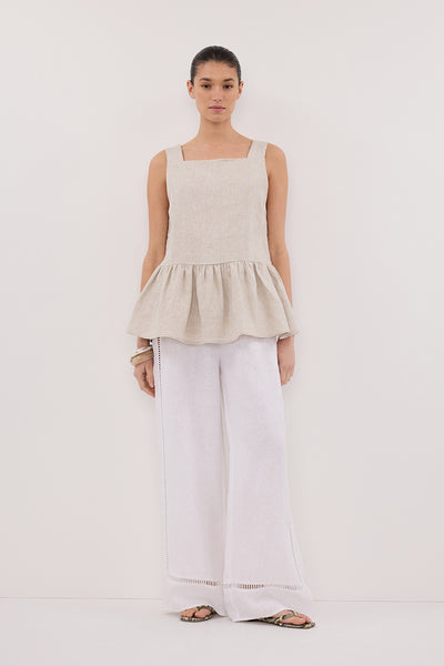 Aude wearing DAISY NATURAL LINEN PEPLUM TOP