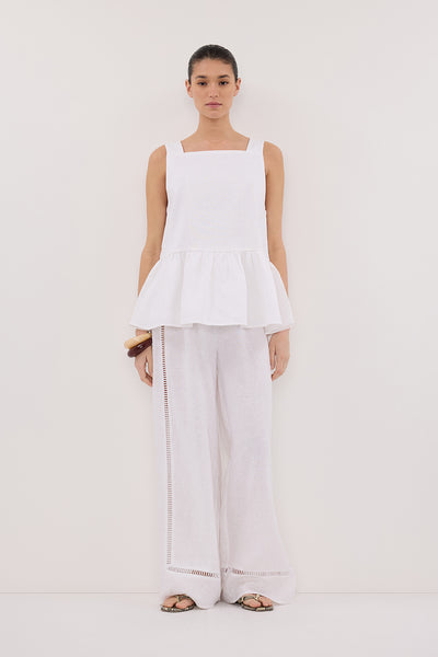 Aude wearing DAISY WHITE LINEN PEPLUM TOP
