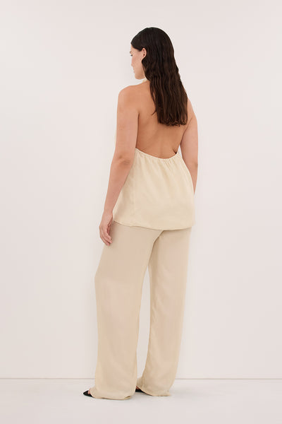 Stas wearing ADDIE STRAW CUPRO HALTER TOP