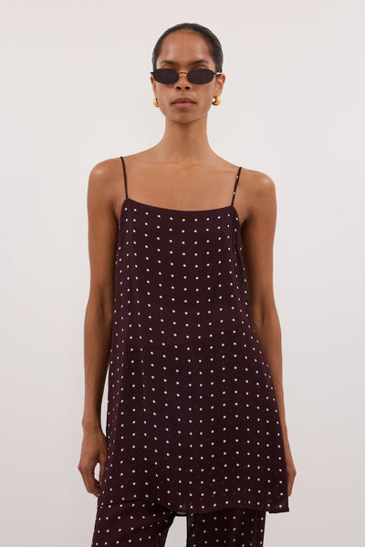 Kristen wearing VANESSA BITTER CHOC SLEEVELESS SPOT CAMI TOP