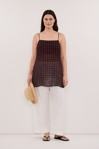 Jasmine wearing VANESSA BITTER CHOC SLEEVELESS SPOT CAMI TOP