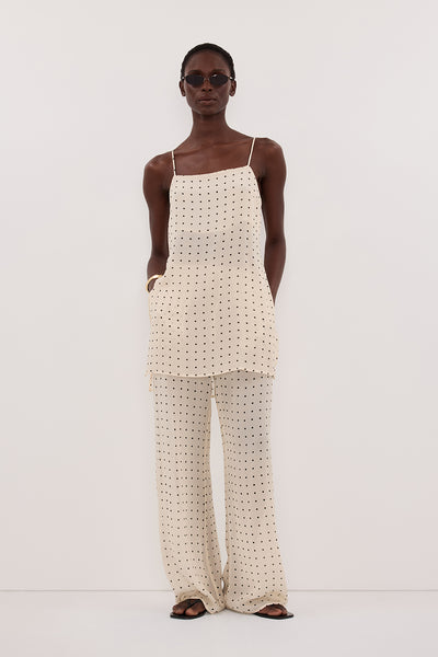 Maguette wearing VANESSA SANDSTONE SLEEVELESS SPOT CAMI TOP