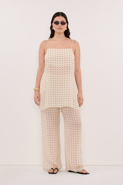 Jasmine wearing VANESSA SANDSTONE SLEEVELESS SPOT CAMI TOP