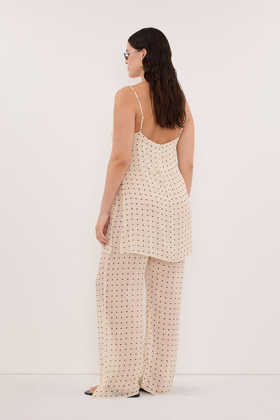 Jasmine wearing VANESSA SANDSTONE SLEEVELESS SPOT CAMI TOP