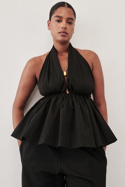 Amanda wearing TAMMY BLACK SLEEVELESS COTTON HALTER TOP