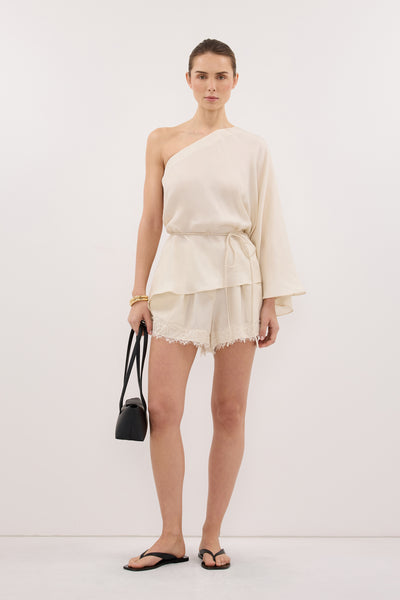 Stas wearing RODEO SANDSTONE CUPRO ASYM TOP