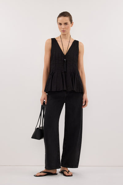 Stas wearing PIXIE BLACK LINEN GODET TOP