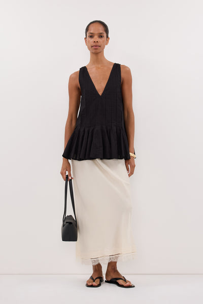 Kristen wearing PIXIE BLACK LINEN GODET TOP