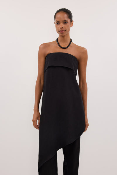 Kristen wearing VENUS BLACK CUPRO ASYM TOP