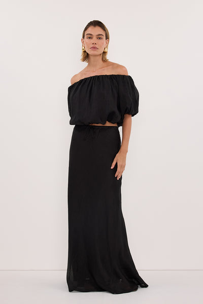 Joanna wearing ARLO BLACK RAMIE OFF SHOULDER BUBBLE TOP