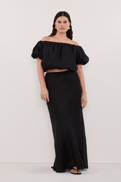 Jasmine wearing ARLO BLACK RAMIE OFF SHOULDER BUBBLE TOP
