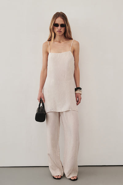 Sabine wearing AMARA CREAM STRIPE CUPRO CAMI TOP