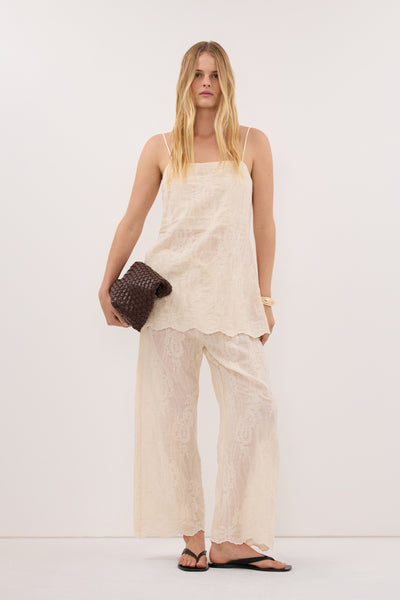 Zoe wearing CORDELIA SANDSTONE RAMIE CAMI TOP