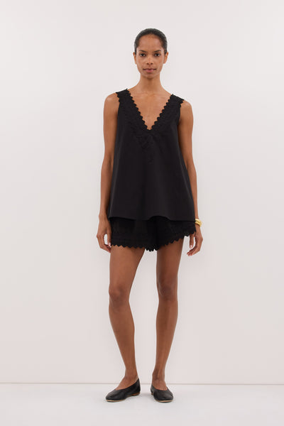 Kristen wearing ANNABEL BLACK V NECK TOP