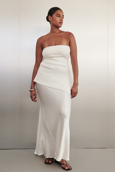 Amanda wearing CHARLI WHITE SATIN MAXI SKIRT