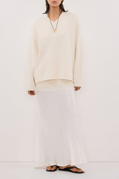 Stas wearing CHARLI WHITE SATIN MAXI SKIRT