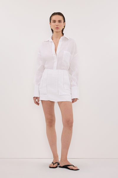 Stas wearing LINDSAY WHITE LINEN SKORT
