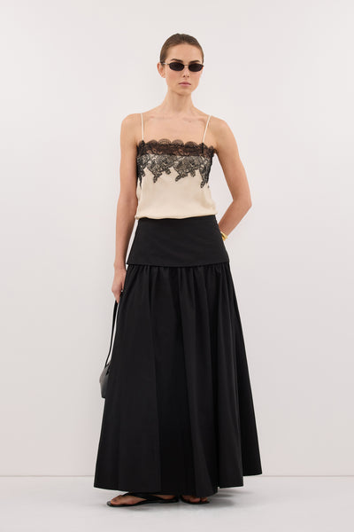 Stas wearing CLAIRE BLACK COTTON MIDI SKIRT