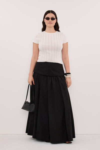 Jasmine wearing CLAIRE BLACK COTTON MIDI SKIRT