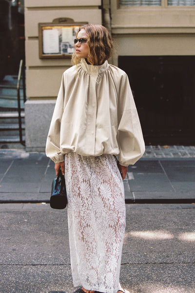 Joanna wearing WILMA WHITE LACE MIDI SKIRT