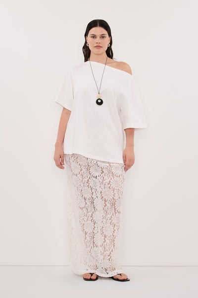 Jasmine wearing WILMA WHITE LACE MIDI SKIRT